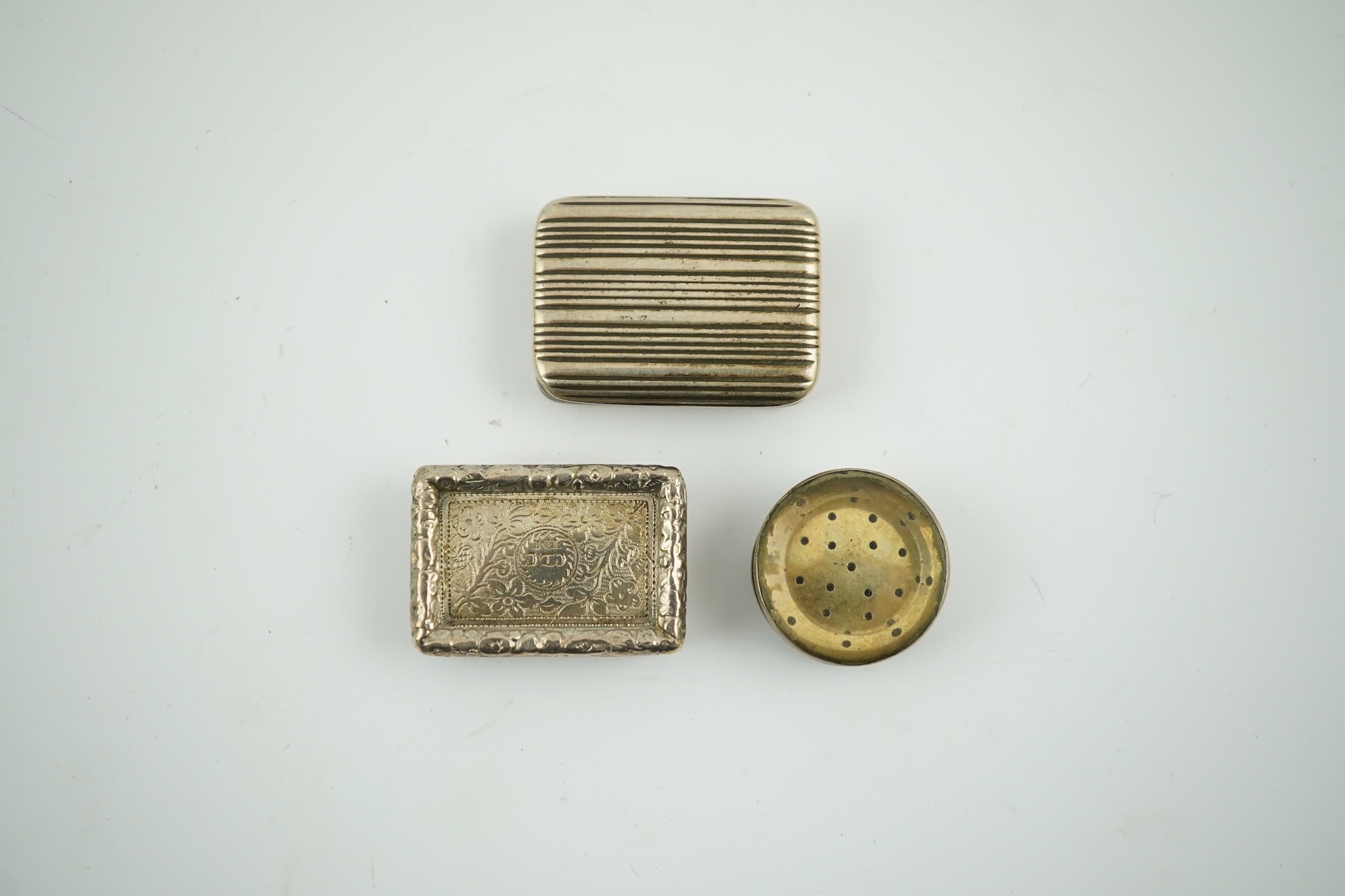 A William IV silver rectangular vinaigrette, William Stroud, Birmingham, 1833, 30mm and two other vinaigrettes. Condition - poor to fair